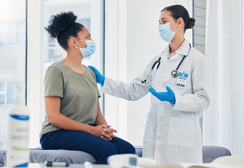 Doctor examining a patient