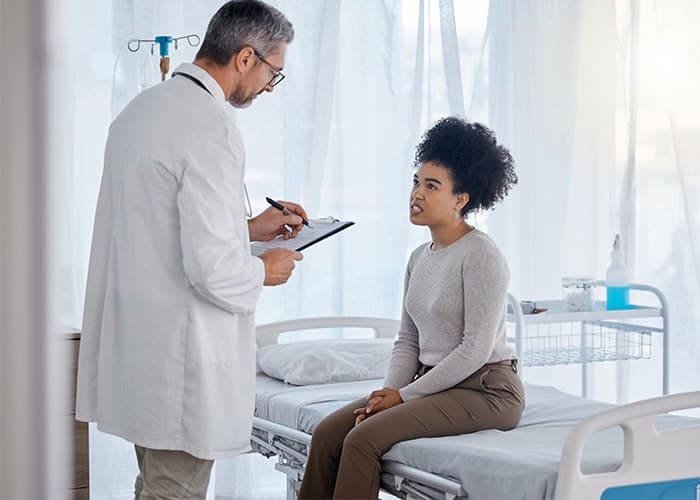 Doctor consulting with patient